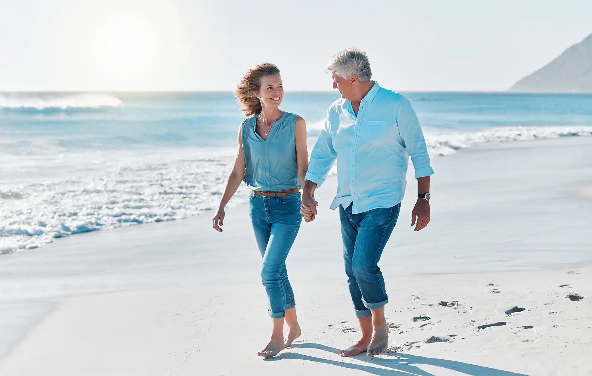 Couple walking on the beach